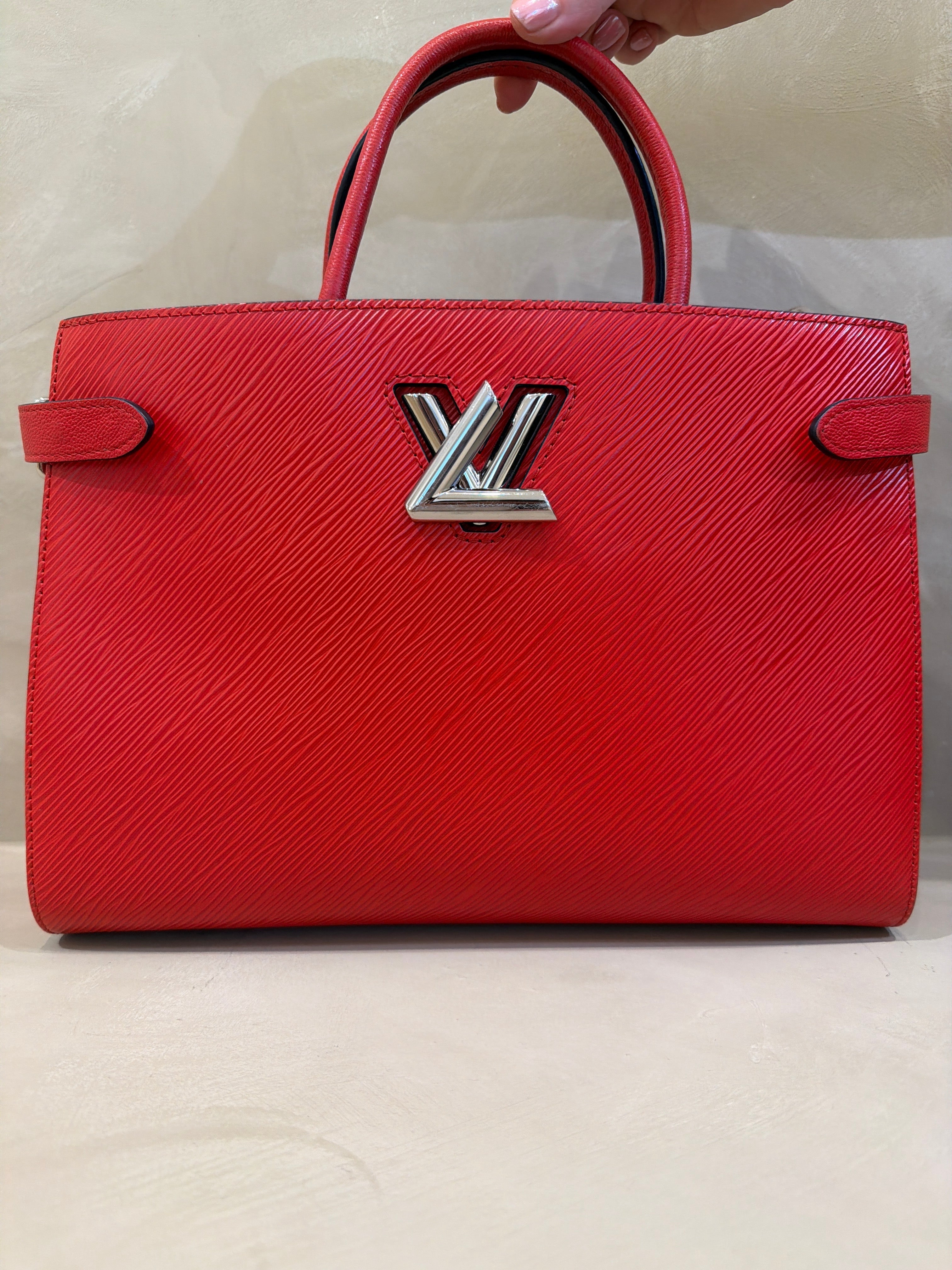 Red Louis Vuitton Twist Tote with silver hardware and slight wear
