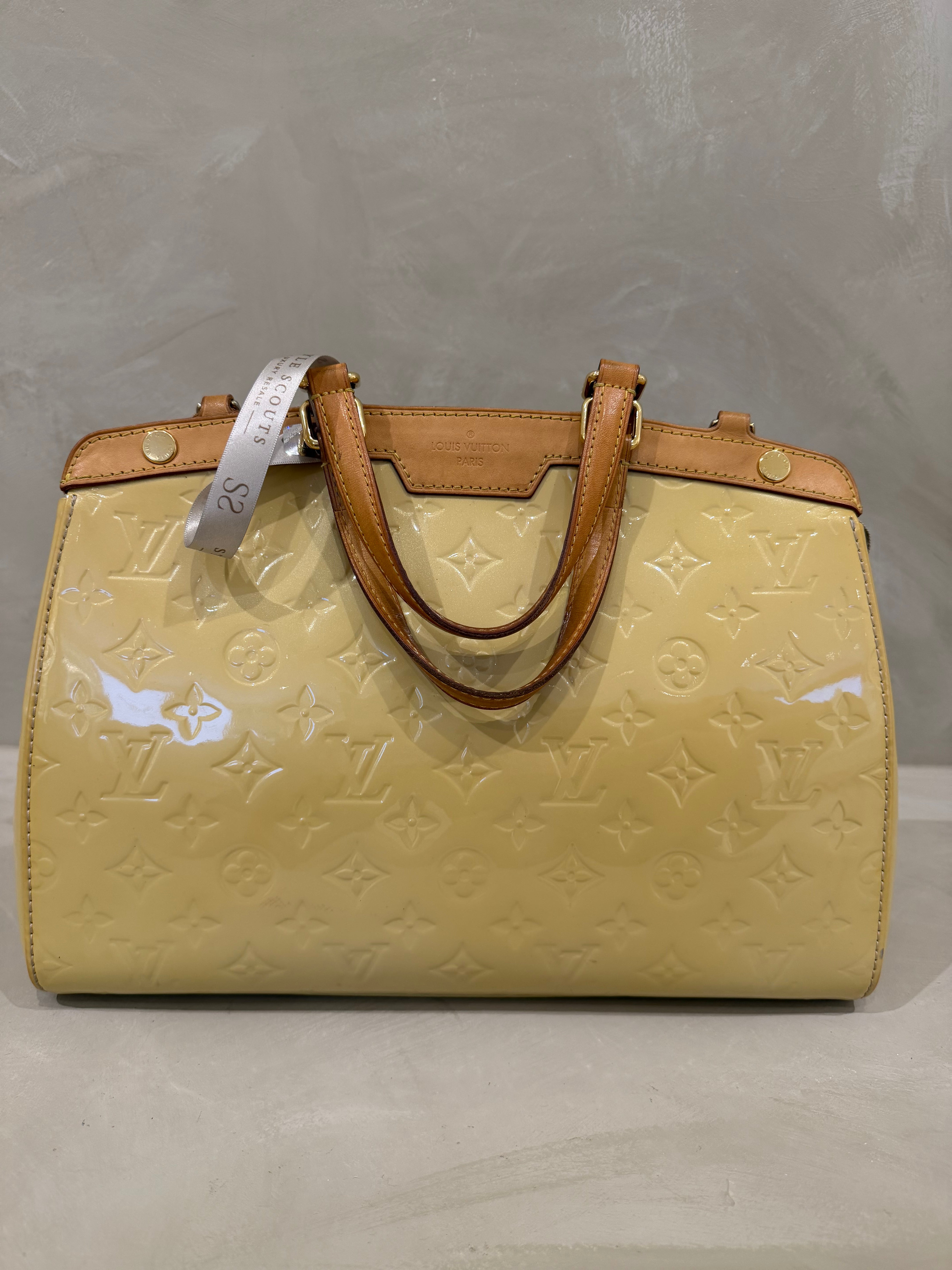 Louis Vuitton Vernis Brea yellow patent leather bag in very good condition with honey patina