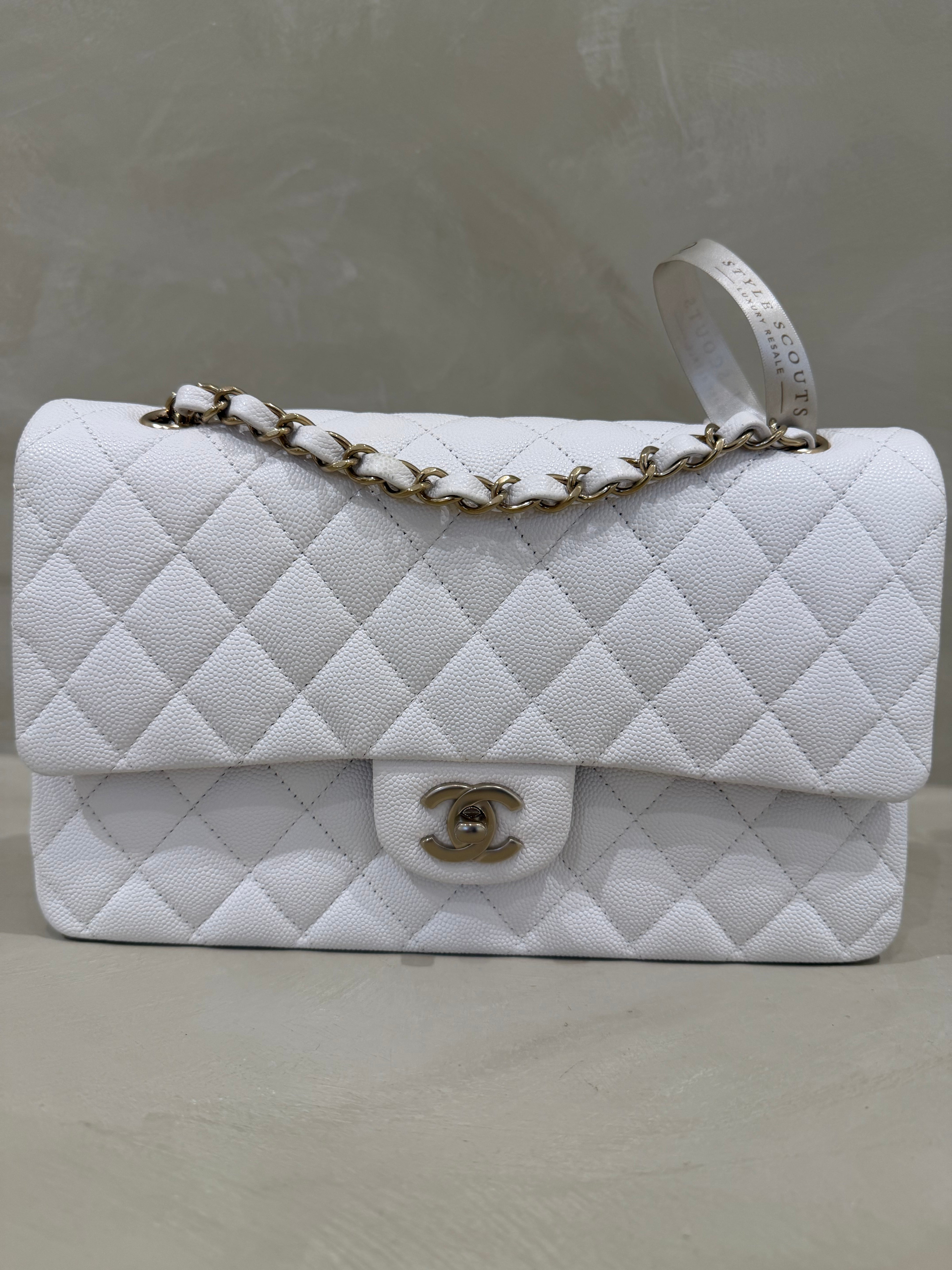 Chanel medium classic flap white caviar leather bag with champagne gold hardware