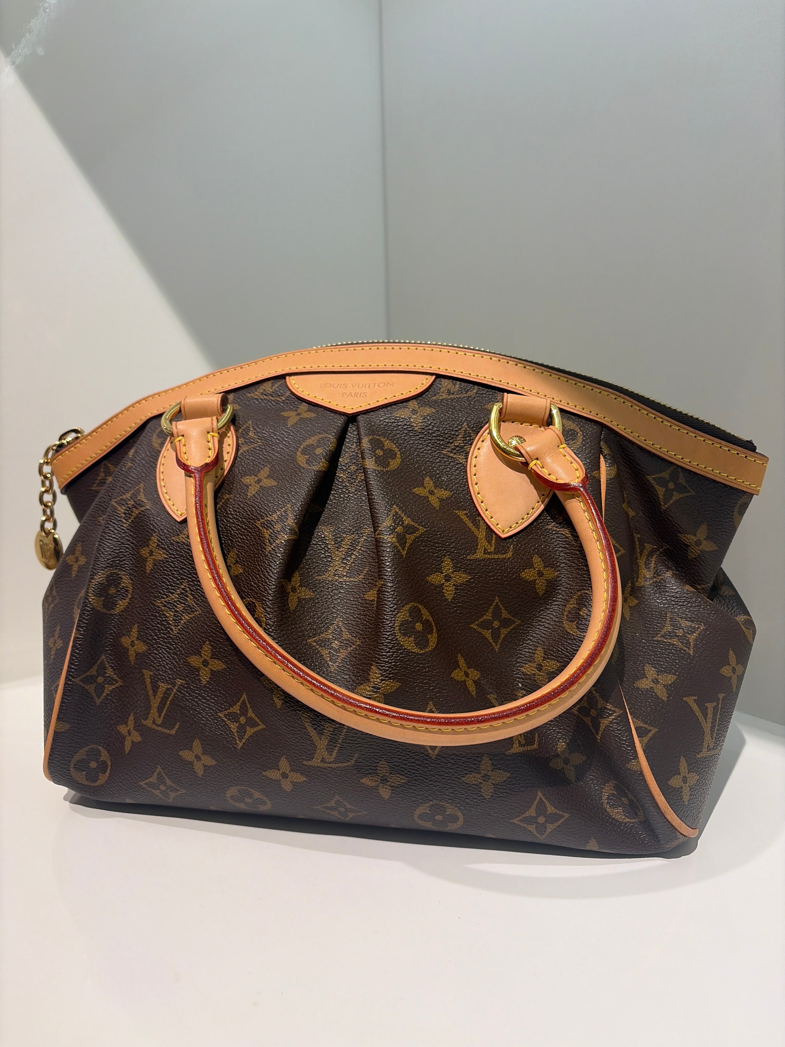 Louis Vuitton Tivoli PM handbag in brown leather with signature monogram pattern