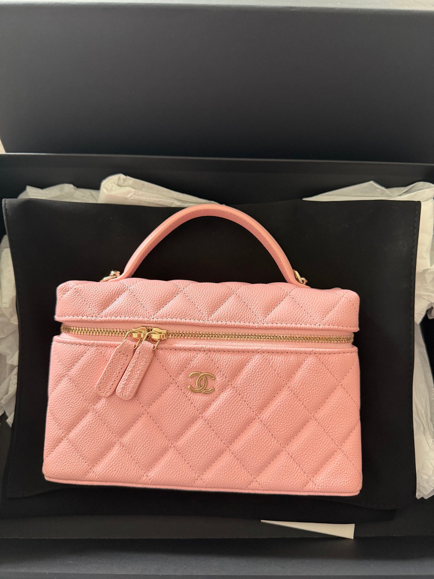 Pink Chanel Vanity Case bag in caviar leather with gold hardware and top handle