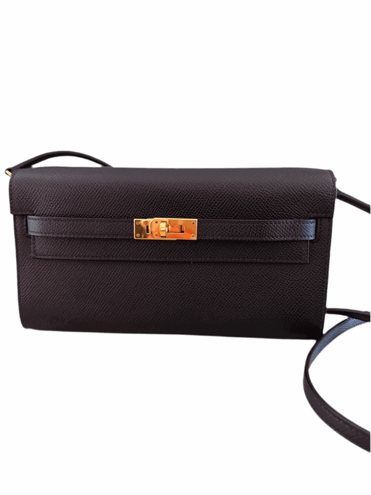 Black Hermes Classique Kelly To Go Wallet in Epsom leather with gold hardware.